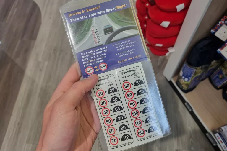 A pack with stickers for the inside of the car windshield to quickly convert between KPH and MPH.