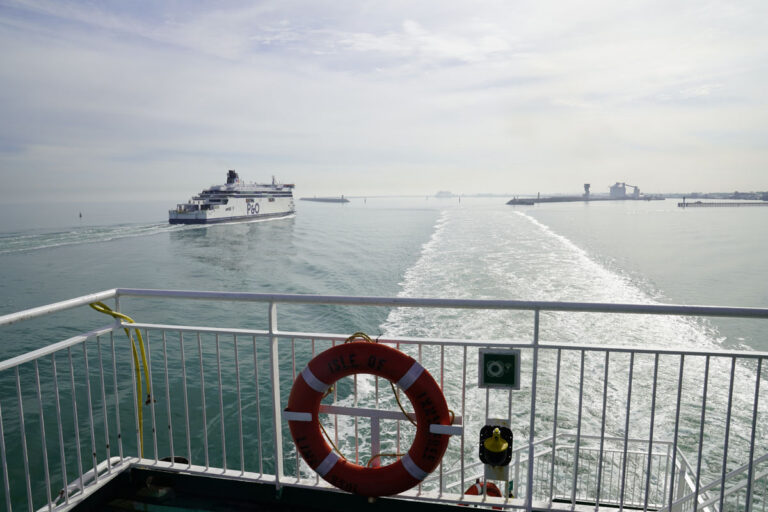 Ferry leaving the port of Calais while another ferry is arriving.